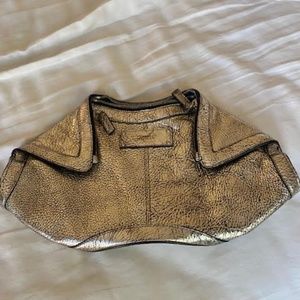 Brand new Alexander McQueen Large Crackled Metal De Manta Clutch